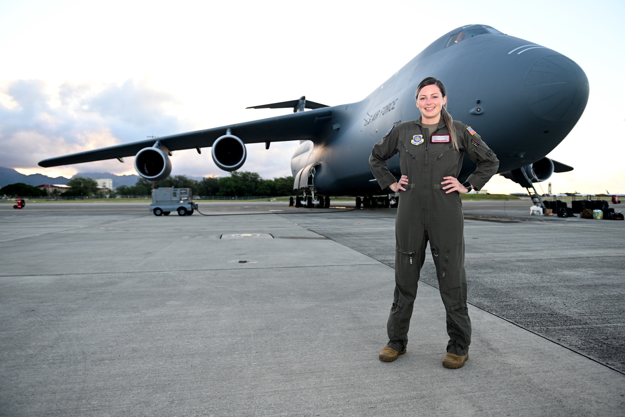 Photos of Airmen loading cargo onto a C-5M Super Galaxy at JBLM and delivering the cargo to Joint Base Pearl Harbor, Hawaii.
