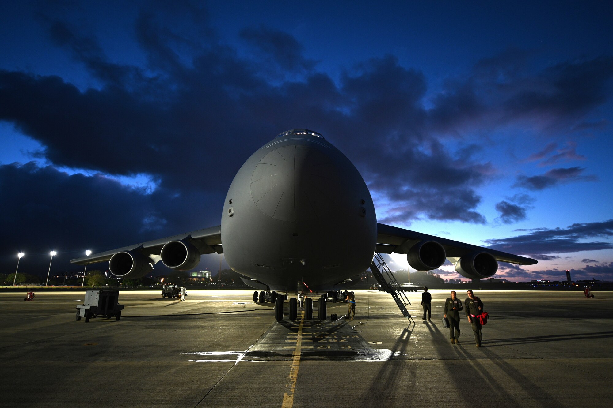 Photo of a C-5M Super Galaxy on the flight line at Hickam AFB, Hawaii.