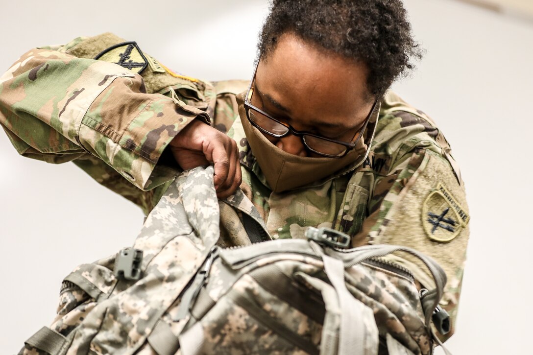 A U.S. Army Reserve Soldier inspects her equipment as part of the in-processing portion of the 2021 U.S. Army Civil Affairs and Psychological Operations Command (Airborne) Best Warrior Competition at Fort Jackson, S.C., April 6. Soldiers from across the nation traveled to compete in the 2021 U.S. Army Civil Affairs and Psychological Operations Command (Airborne) Best Warrior Competition, hosted from April 5-10, at Fort Jackson, S.C. The USACAPOC(A) BWC is an annual competition that brings in the best Soldiers across USACAPOC(A) to earn the title of “Best Warrior” among their peers after being evaluated on their individual ability to adapt and overcome challenging scenarios and battle-focused events, testing their technical and tactical abilities under stress and extreme fatigue.