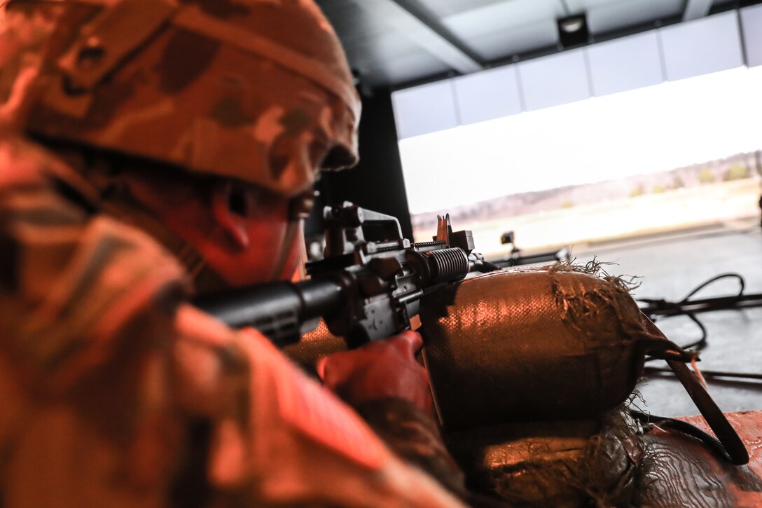 A U.S. Army Reserve Soldier uses an electronic M4 carbine for an engagement skills training session during the in-processing portion of the 2021 U.S. Army Civil Affairs and Psychological Operations Command (Airborne) Best Warrior Competition at Fort Jackson, S.C., April 6. Soldiers from across the nation traveled to compete in the 2021 USACAPOC(A) Best Warrior Competition, hosted from April 5-10, at Fort Jackson, S.C. The USACAPOC(A) BWC is an annual competition that brings in the best Soldiers across USACAPOC(A) to earn the title of “Best Warrior” among their peers after being evaluated on their individual ability to adapt and overcome challenging scenarios and battle-focused events, testing their technical and tactical abilities under stress and extreme fatigue.