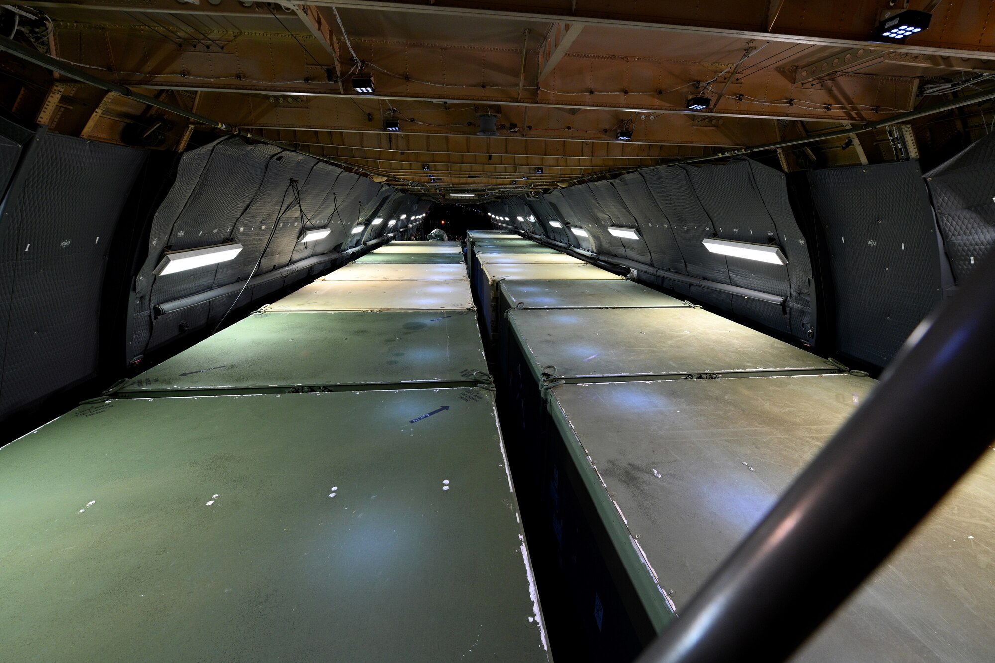 Photos of Airmen loading cargo onto a C-5M Super Galaxy at JBLM and delivering the cargo to Joint Base Pearl Harbor, Hawaii.