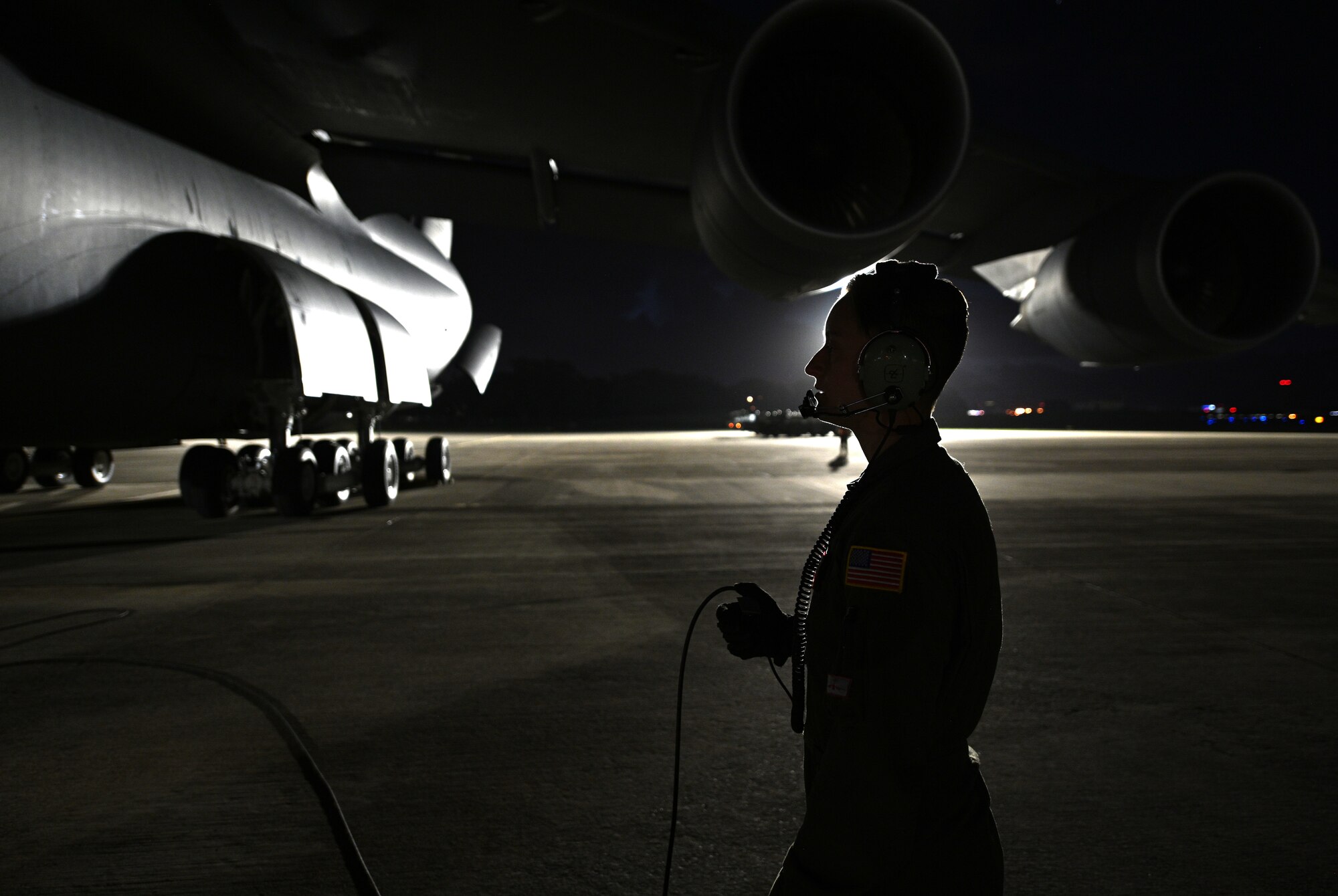 Photos of Airmen loading cargo onto a C-5M Super Galaxy at JBLM and delivering the cargo to Joint Base Pearl Harbor, Hawaii.