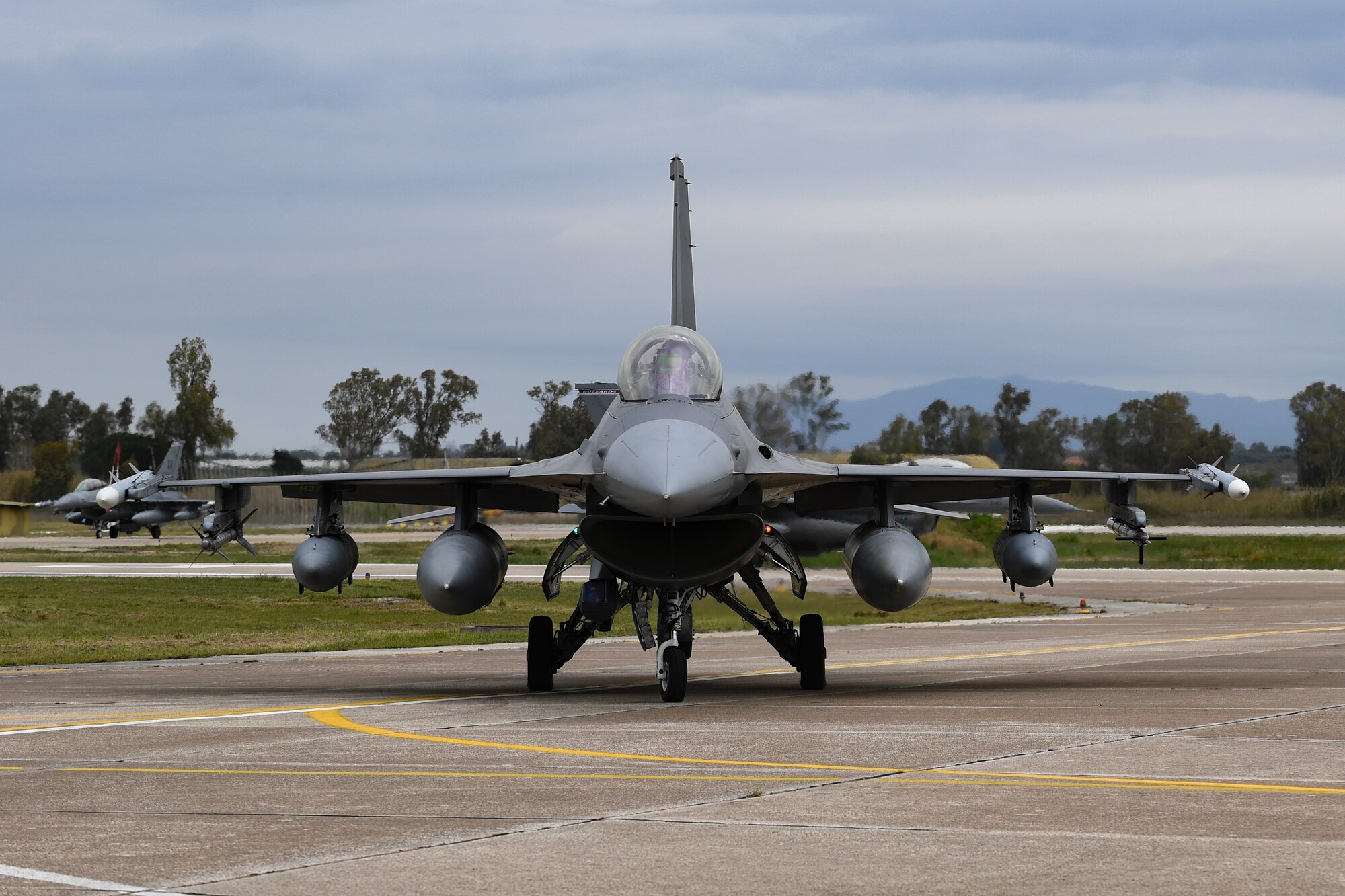 A U.S. Air Force F-16 Fighting Falcon from the 31st Fighter Wing taxis on the runway at Andravida Air Base, Greece, April 6, 2021. F-16s from the 31st FW arrived in Greece to participate in INIOCHOS 21, a Hellenic air force-led, large force flying exercise focused on strengthening partnerships and interoperability. (U.S. Air Force photo by Airman 1st Class Thomas S. Keisler IV)