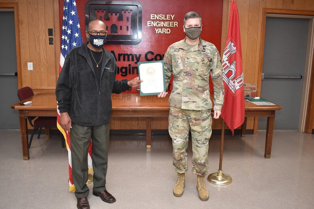 Memphis District Commander Col. Zachary Miller presents Heavy Mobile Equipment Mechanic Leader Robert Woods (left) with a service award on his 40 year anniversary. Congratulations again to Mr. Robert Woods, and many thanks for your dedicated service to the Memphis District, the Mississippi Valley Division, and the U.S. Army Corps of Engineers.