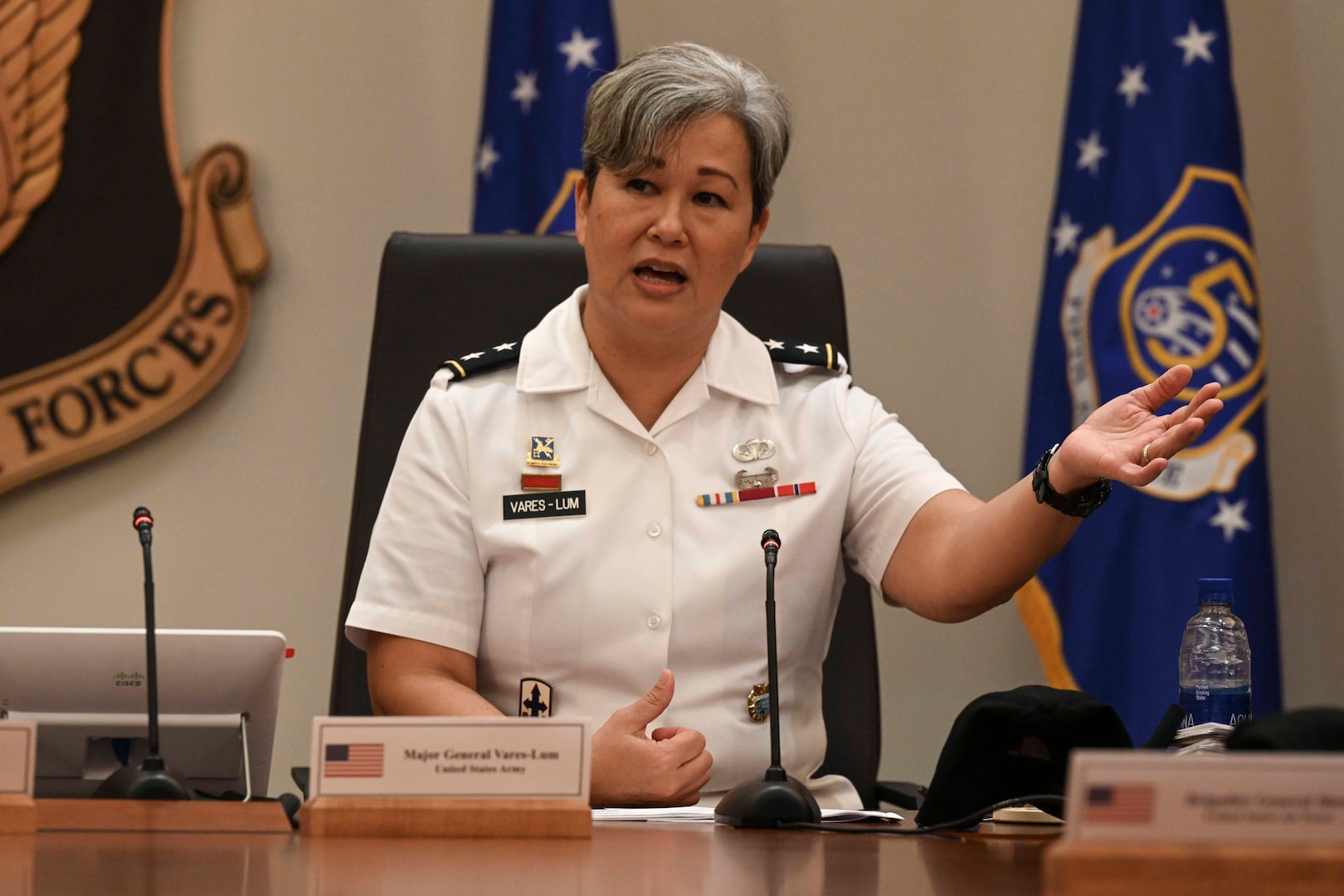 An officer speaks at a Women, Peace and Security symposium.