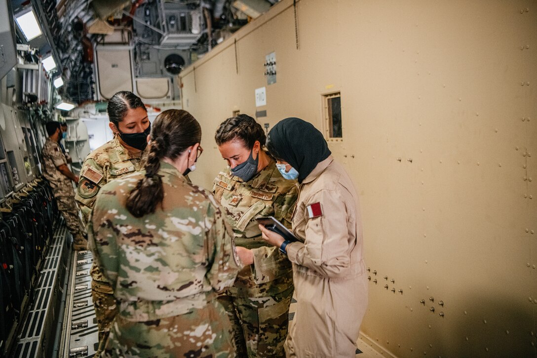 Women speak about the negatively pressurized CONEX on a C-17