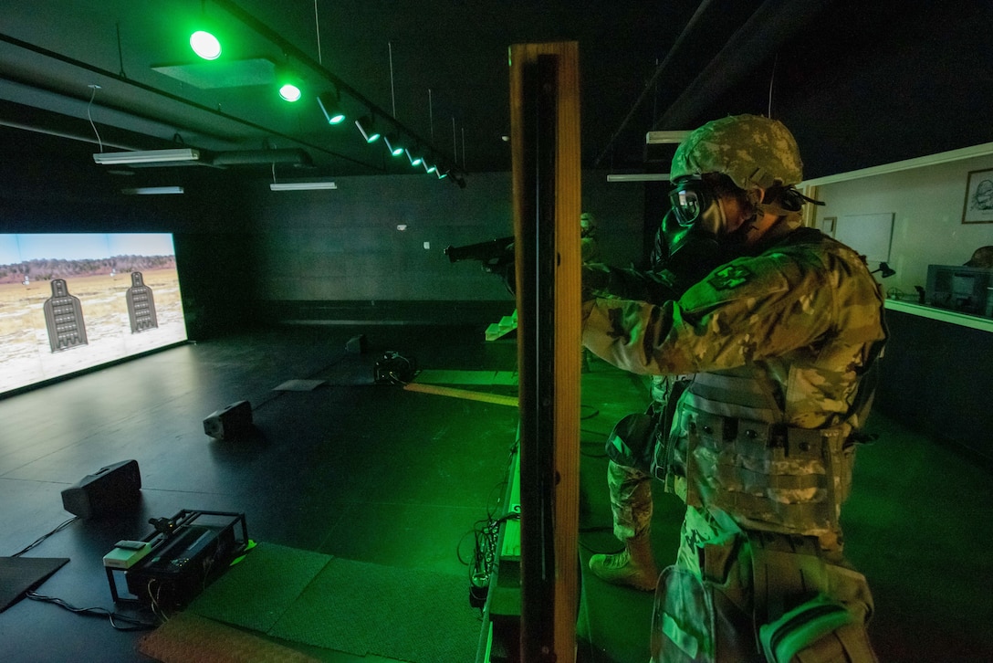 811th Hospital Center Soldiers complete M9 and M4 simulations training on Engagement Skills Trainer