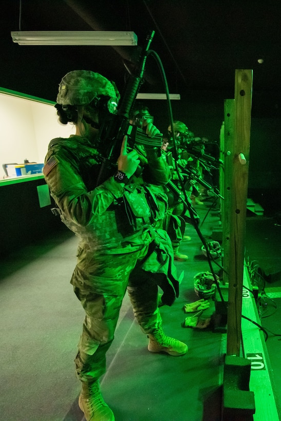 811th Hospital Center Soldiers complete M9 and M4 simulations training on Engagement Skills Trainer