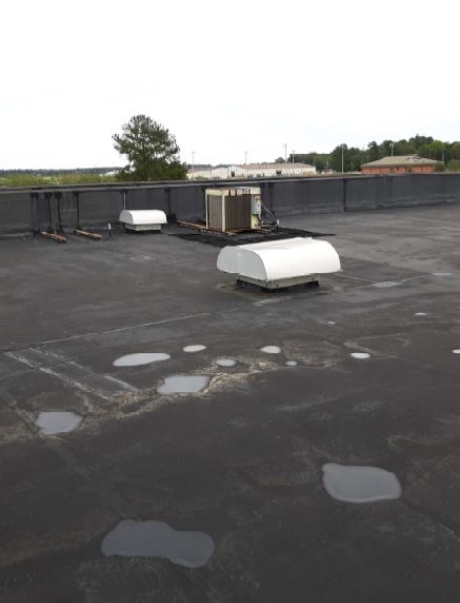 The prior roof was replaced because of water leaking through the roof into the Base Exchange. CYE Enterprises was awarded a contract to replace the roof. (Courtesy photo)