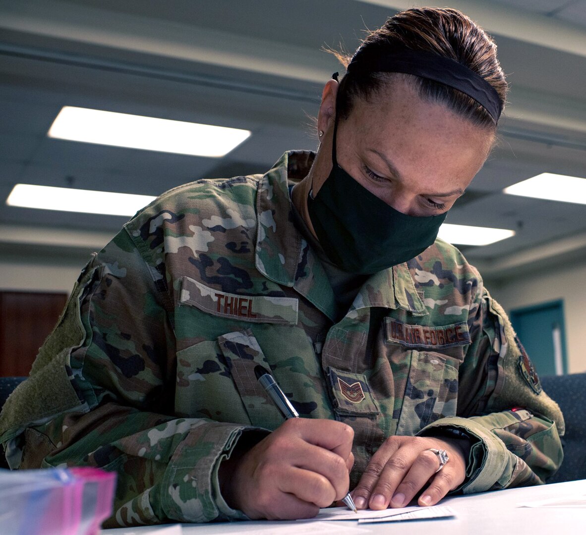 Tech. Sgt. Alicia Thiel, a bioenvironmental engineer with the 149th Medical Group, prepares vaccination cards for the day’s walk-in COVID-19 vaccination clinic on Joint Base San Antonio-Lackland April 1. Thiel is responsible for ensuring recipients understand the prescreening questionnaire and are able to speak to a physician about any questions or concerns they have.