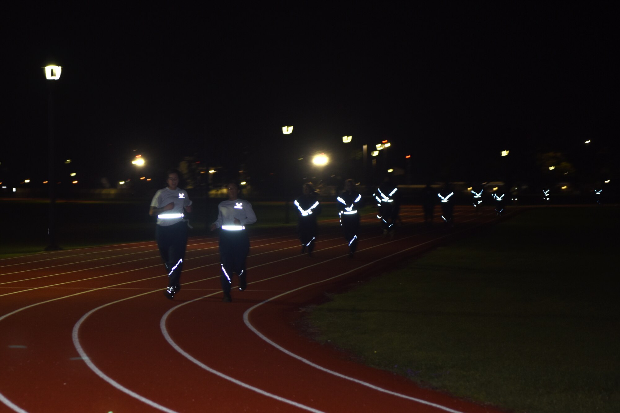 Airmen from the 334th Training Squadron participate in the seventh annual Airman 1st Class Antoine Holt Memorial 5k Run at the Triangle Track on Keesler Air Force Base, Mississippi, April 1, 2021. The run was held in honor of Holt, 334th TRS command and control battle operations operator, who was killed during a mortar attack in Iraq, April 10, 2004. (U.S. Air Force photo by Airman 1st Class Jasmine Galloway)