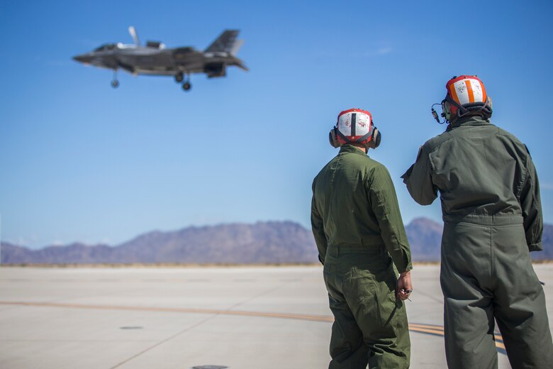 U.S. Marines with Marine Aircraft Group (MAG) 13 conduct refueling operations during a Strike Coordination and Reconnaissance (SCAR) mission aboard a simulated naval vessel at KNOZ range, Yuma, AZ., March 4, 2021. The large-force exercise was implemented in order to project the capabilities of "island hopping" and consisted of multiple MAG-13 assets, including ground support from Marine Wing Support Squadron (MWSS) 371 and aircraft from Marine Fighter Attack Squadron (VMFA) 122. (U.S. Marine Corps photo by Lance Cpl John Hall)