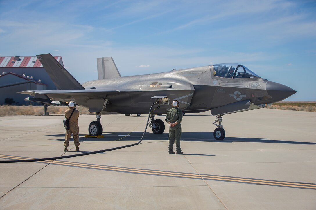 U.S. Marines with Marine Aircraft Group (MAG) 13 conduct refueling operations during a Strike Coordination and Reconnaissance (SCAR) mission aboard a simulated naval vessel at KNOZ range, Yuma, AZ., March 4, 2021. The large-force exercise was implemented in order to project the capabilities of "island hopping" and consisted of multiple MAG-13 assets, including ground support from Marine Wing Support Squadron (MWSS) 371 and aircraft from Marine Fighter Attack Squadron (VMFA) 122. (U.S. Marine Corps photo by Lance Cpl John Hall)