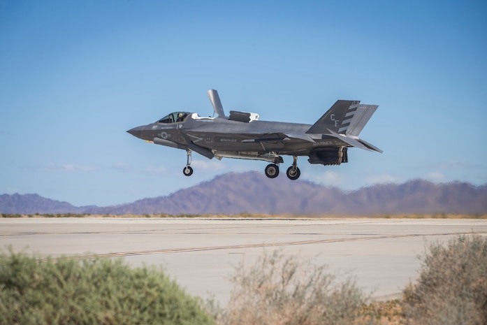 U.S. Marines with Marine Aircraft Group (MAG) 13 conduct refueling operations during a Strike Coordination and Reconnaissance (SCAR) mission aboard a simulated naval vessel at KNOZ range, Yuma, AZ., March 4, 2021. The large-force exercise was implemented in order to project the capabilities of "island hopping" and consisted of multiple MAG-13 assets, including ground support from Marine Wing Support Squadron (MWSS) 371 and aircraft from Marine Fighter Attack Squadron (VMFA) 122. (U.S. Marine Corps photo by Lance Cpl John Hall)