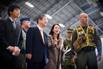 YOKOTA AIR BASE, Japan -- Capt. Klusmann, initial response force commander, provides Toshimi Kitazawa, Japan Minister of Defense, a demonstration of IRF functions at Hangar 15 here April 23.  The specialized team deployed to Yokota and remains on stand-by to support the Government of Japan if requested. (U.S. Air Force photo/Staff Sgt. Chad C. Strohmeyer)