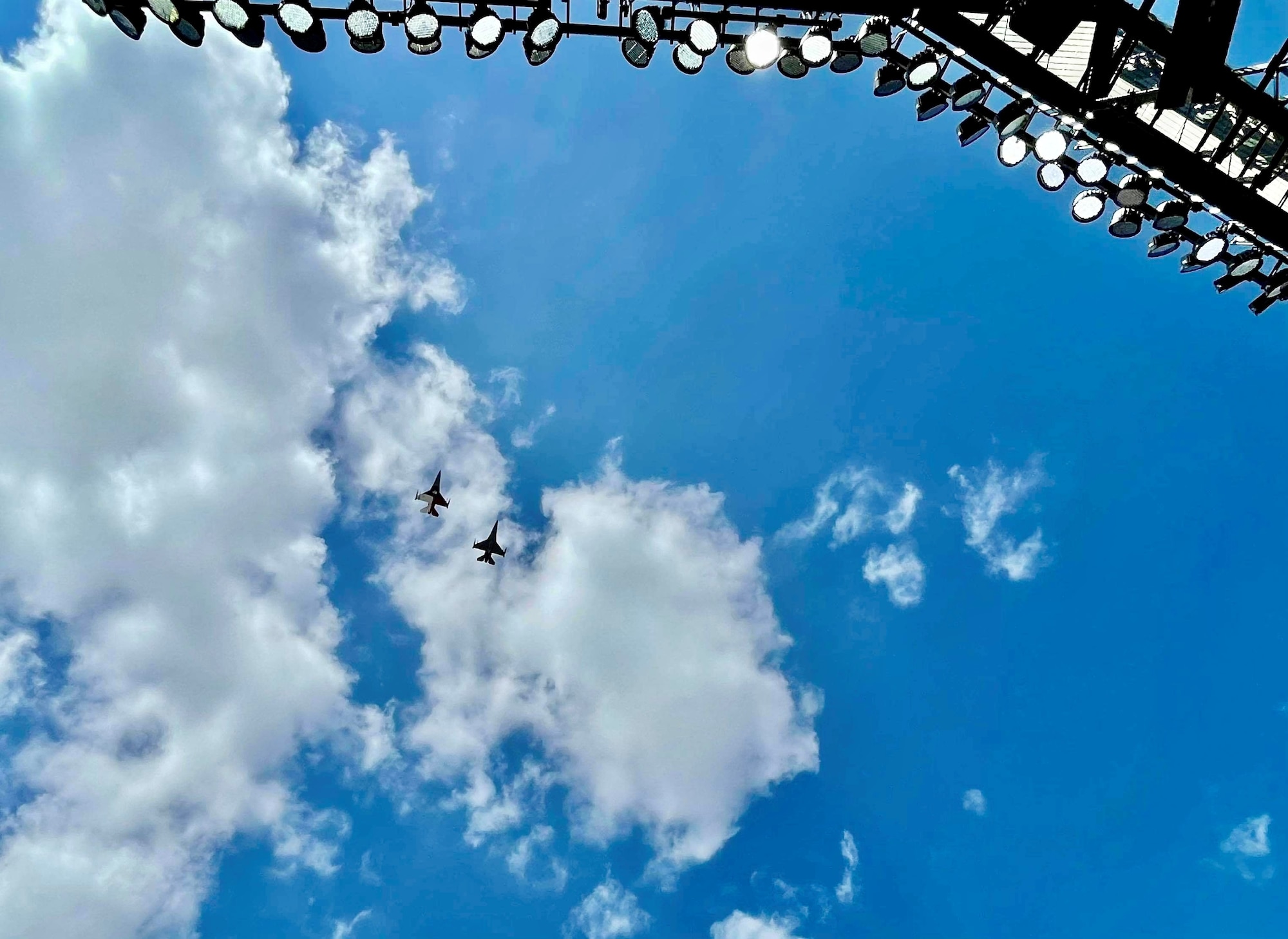 F-16C Fighting Falcon pilots assigned to the 457th Fighter Squadron, 301st Fighter Wing, U.S. Naval Air Station Joint Reserve Base Fort Worth, Texas performed a flyover during the opening ceremony for Major League Baseball’s Texas Rangers team on Opening Day at Globe Life Field, April 5, 2021. The stadium opened for the first time to the public for a Texas Rangers game since its construction in 2020.