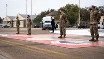 Leaders from the 2nd Bomb Wing and Air Force Global Strike Command await the arrival of Honorable John P. Roth, acting Secretary of the Air Force, at Barksdale Air Force Base, Louisiana, April 6, 2021.