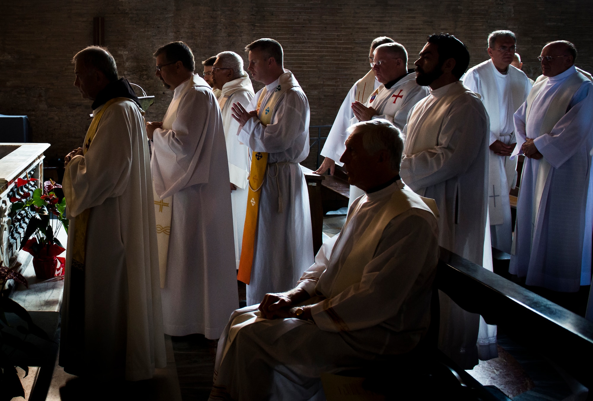 Priests participating in a sabbatical program at the Pontifical Northern American College in Vatican City join together for Catholic Mass in a chapel connected to the Basilica of St. John Lateran in Rome. The Basilica is the cathedral church of the Diocese of Rome and the official ecclesiastical seat of the Bishop of Rome, who is the Pope. (U.S. Air Force photo/Staff Sgt. Andrew Lee)