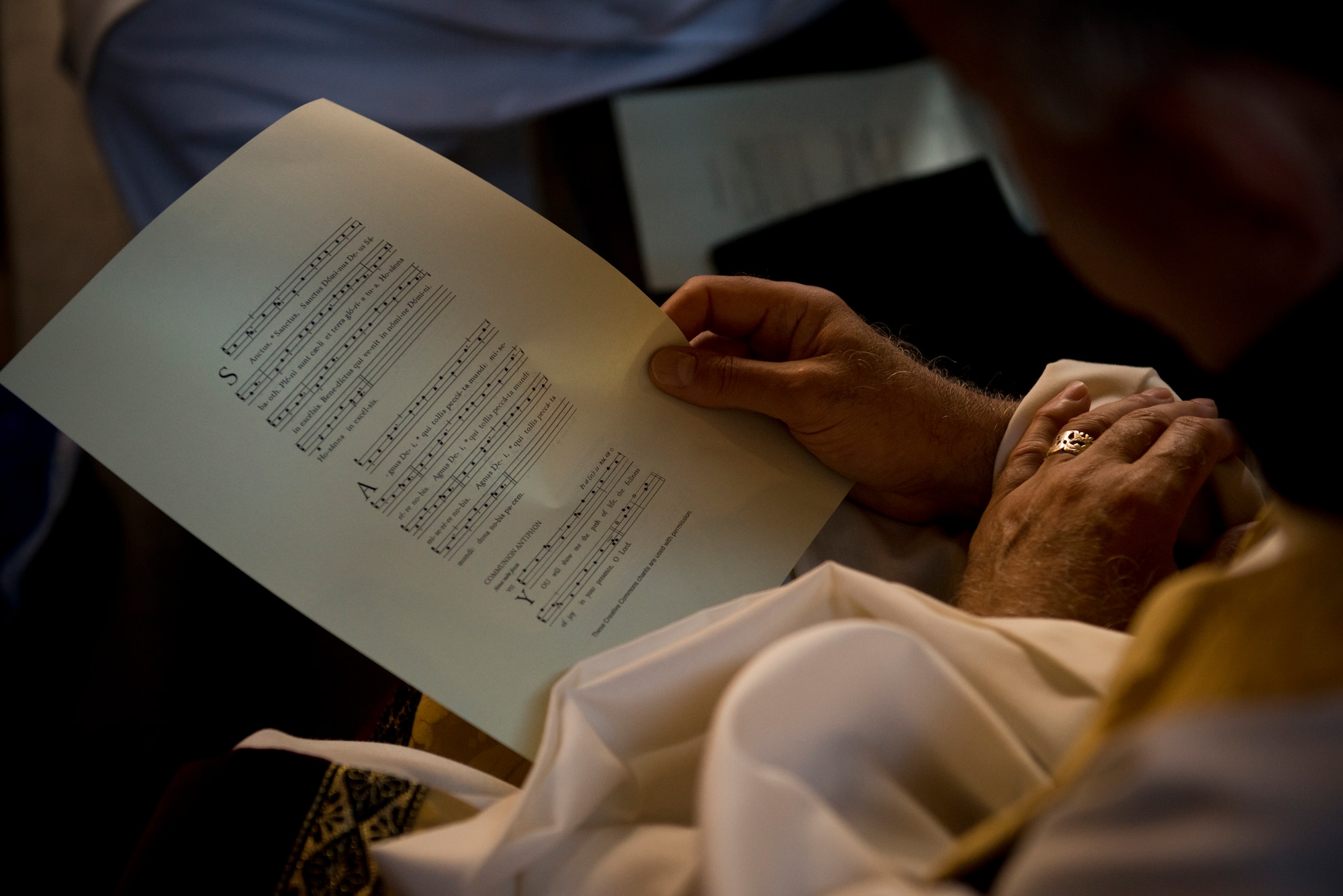 Retired Chaplain (Lt. Col.) Robert Bruno recites a chant while attending Catholic Mass in the Basilica of St. John Lateran in Rome. (U.S. Air Force photo/Staff Sgt. Andrew Lee)