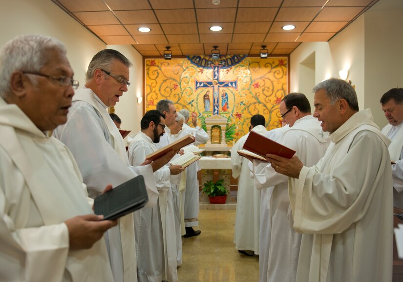 Alongside other members of a sabbatical program, retired Chaplain (Lt. Col.) Robert Bruno sings songs of worship during a morning prayer service. The program, which is located on Pontifical Northern American College campus, is designed to give Catholic priests a chance to refresh and rewind, while still learning, after years of providing service to others. (U.S. Air Force photo/Staff Sgt. Andrew Lee)