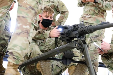 U.S. Army Reserve Spc. Daab Jackson, a Buckeye, Arizona native, and civil affairs specialist with the 492nd Civil Affairs Battalion, inspects an M2 .50-caliber machine gun during the first day of the 2021 U.S. Army Civil Affairs and Psychological Operations Command (Airborne) Best Warrior Competition at Fort Jackson, S.C., April 7, 2021. The USACAPOC(A) BWC is an annual competition that brings in the best Soldiers across USACAPOC(A) to earn the title of “Best Warrior.” BWC tests the Soldiers’ individual ability to adapt and overcome challenging scenarios and battle-focused events, testing their technical and tactical skills under stress and extreme fatigue.