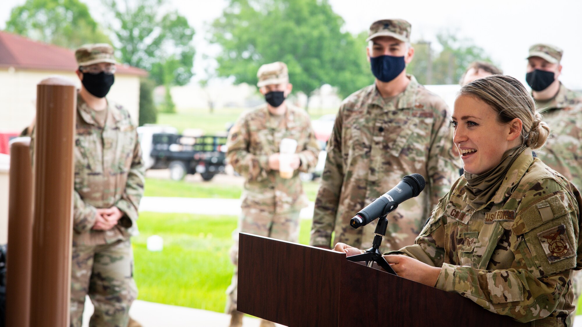 Staff Sgt. Heather Carmody, 2nd Civil Engineer Squadron firefighter, addresses attendees of the ribbon cutting ceremony for Fire Station Two at Barksdale AFB, Louisiana, April 7, 2021.