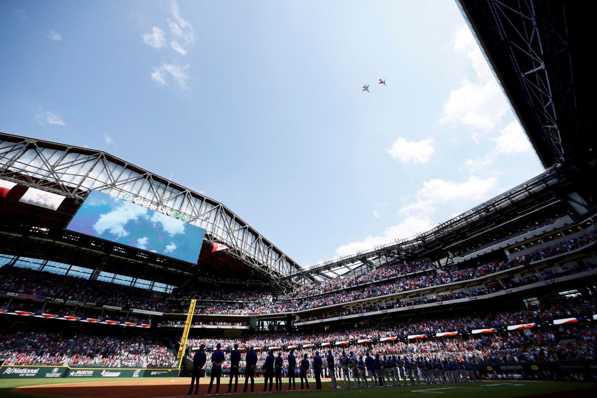 F-16C Fighting Falcon pilots assigned to the 457th Fighter Squadron, 301st Fighter Wing, U.S. Naval Air Station Joint Reserve Base Fort Worth, Texas performed a flyover during the opening ceremony for Major League Baseball’s Texas Rangers team on Opening Day at Globe Life Field, April 5, 2021. The stadium opened for the first time to the public for a Texas Rangers game since its construction in 2020.