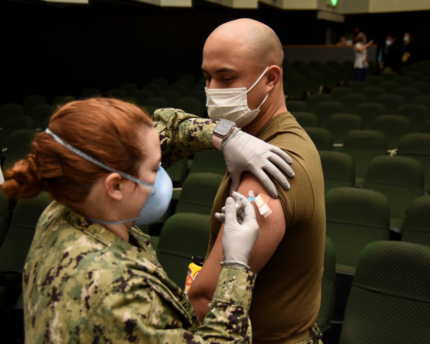 SASEBO, Japan (Feb. 3, 2021) – Lt. j.g. Jake Boldes, from Seattle, assigned to the USS Green Bay (LPD 20), receives a Moderna COVID-19 vaccine from Hospital Corpsman 3rd Class Keating Beach, from Frederick, Md.,  assigned to U.S. Naval Hospital Yokosuka Branch Health Clinic Sasebo onboard Commander, Fleet Activities Sasebo Feb. 3, 2021. Green Bay, part of Amphibious Squadron 11, is forward deployed to the U.S. 7th Fleet area of operations to enhance interoperability with allies and partners and serve as a ready response force to defend peace and stability in the Indo-Pacific region. (U.S. Navy photo by Mass Communication Specialist 2nd Class Gregory A. Pickett II)