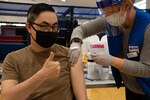 YOKOSUKA, Japan (March 18, 2021) — Cmdr. Terry McNamara, chief staff officer for Commander, Fleet Activities Yokosuka (CFAY) receives his one-shot Johnson & Johnson COVID-19 vaccine from Mercedes Fritz, a residency nurse with American Red Cross Yokosuka, during a vaccine distribution at CFAY’s Hawk’s Nest. Service members assigned to CFAY and tenant commands received the one-shot vaccine during the vaccine distribution.  For more than 75 years, CFAY has provided, maintained, and operated base facilities and services in support of the U.S. 7th Fleet's forward-deployed naval forces, tenant commands, and thousands of military and civilian personnel and their families. (U.S. Navy photo by Ryo Isobe)