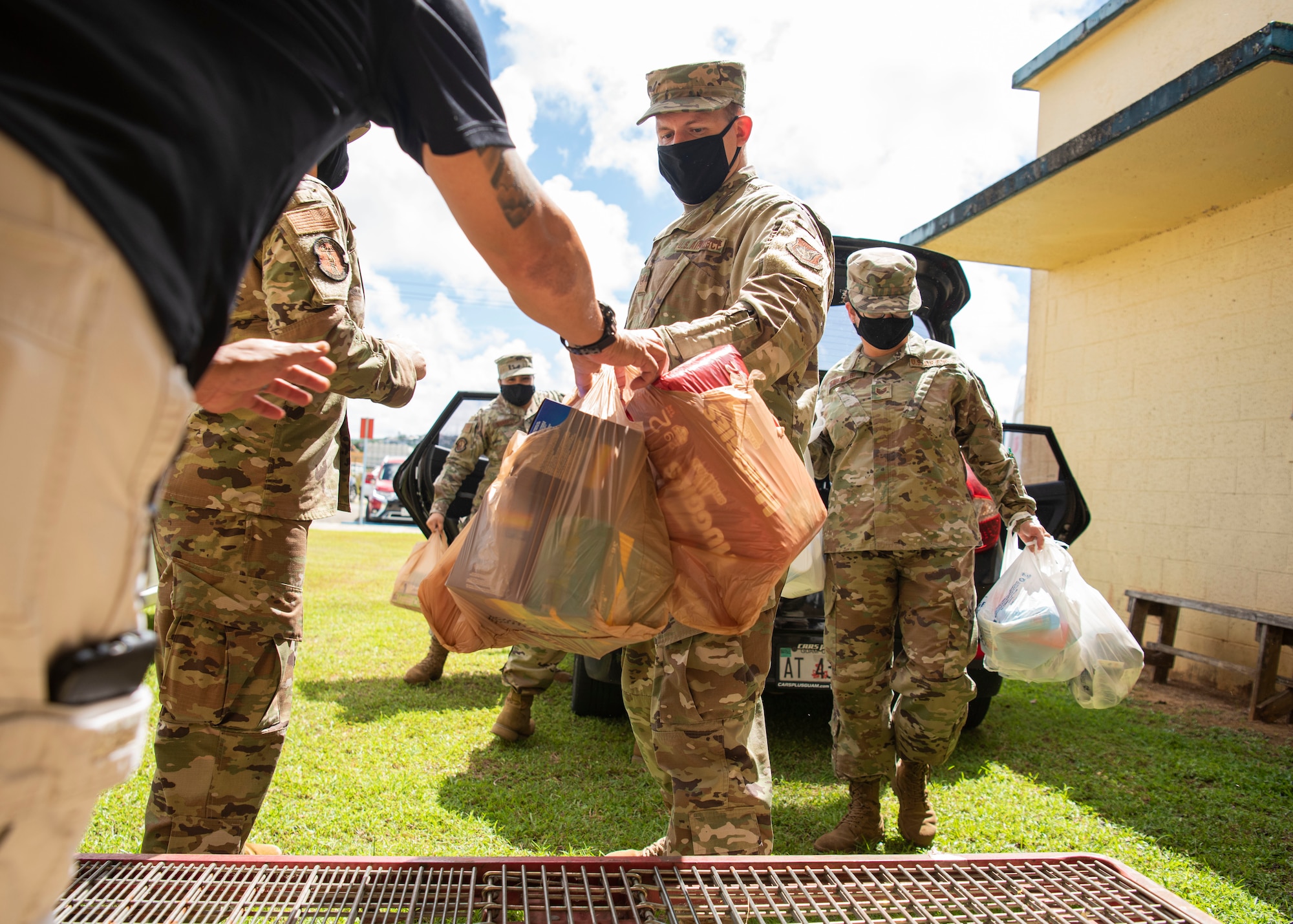 U.S. Air Force Airmen from Andersen Air Force Base’s Air Force Sergeants Association Chapter 1560 donate essential items at The Salvation Army Guam Corps headquarters in Barrigada, Guam, April 8, 2021. The AFSA members garnered more than 1,800 items through donation drives during the month of March, which totaled to $10,000 in assistance for The Salvation Army. (U.S. Air Force photo by Senior Airman Aubree Owens)