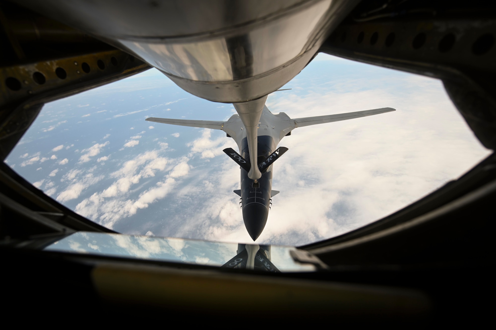 A U.S. Air Force B-1B Lancer aircraft assigned to the 28th Bomb Wing receives fuel from a KC-135 Stratotanker aircraft assigned to the 100th Air Refueling Wing during a Bomber Task Force mission over the Mediterranean Sea, April 7, 2021. The U.S. routinely and visibly demonstrates commitment to allies and partners through the global employment of its military forces. (U.S. Air Force photo by Senior Airman Joseph Barron)