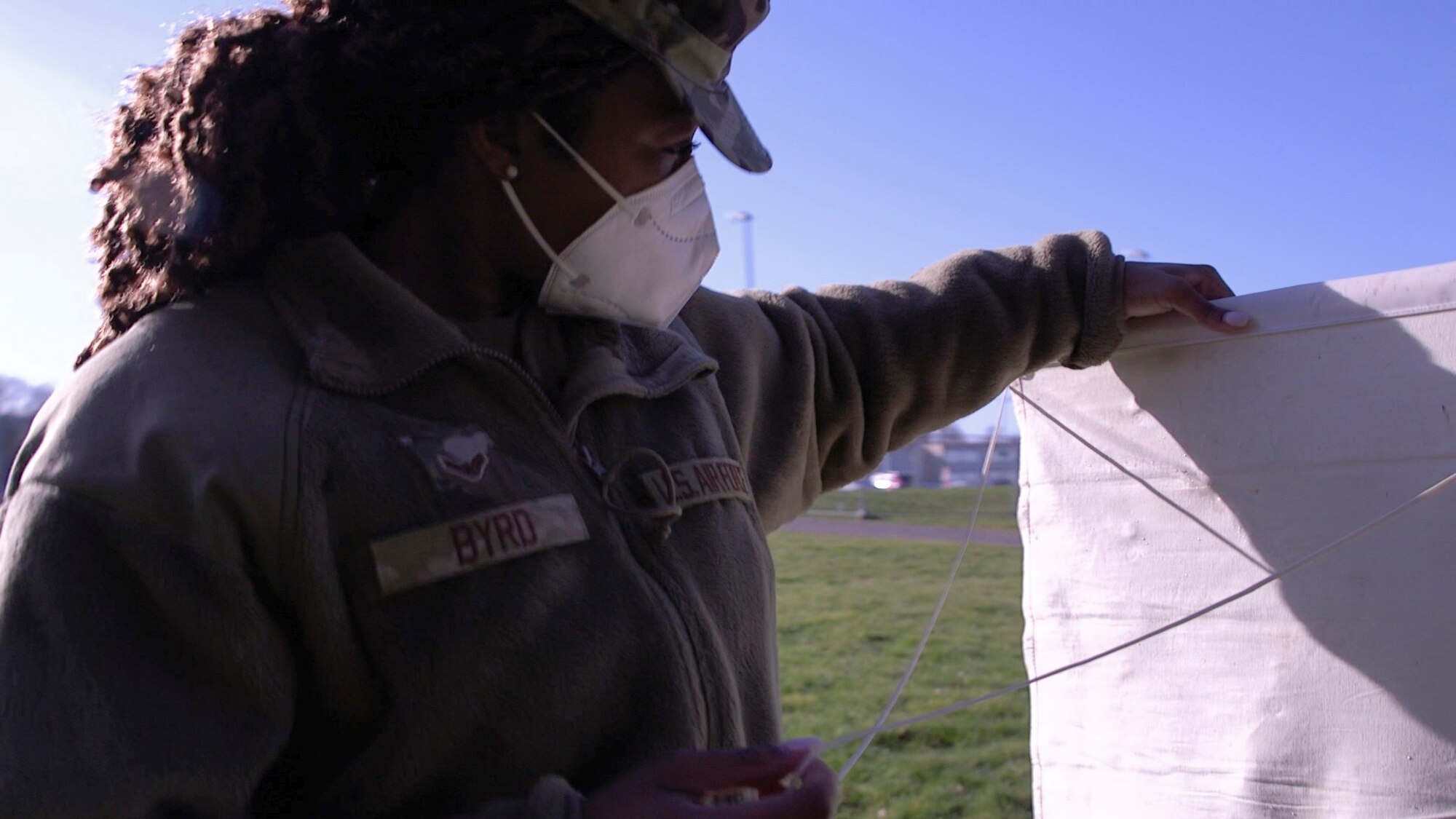 U.S. Air Force Airman 1st Class Arbryonna Byrd, 52nd Medical Group Public Health technician, looks over a tick drag at Spangdahlem Air Base Germany, March 29, 2021. The Community Health section of Public Health has a medical entomology program that informs the public on what disease might come from potential vectors such as ticks and mosquitos in the area.  (U.S. Air Force photo by Tech. Sgt. Warren D. Spearman Jr.)
