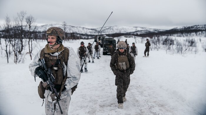 U.S. Marines with Marine Rotational Force Europe 21.1, Marine Forces Europe and Africa, conduct a combat patrol during a company live-fire attack as part of Exercise Arctic Littoral Strike in Blåtind, Norway, March 30, 2021. Exercise Arctic Littoral Strike improved MRF-E’s ability to confront the challenges of anti-access, area denial capabilities posed by a notional peer adversary in a contested littoral environment. MRF-E demonstrated the ability to support joint fleet operations by providing over watch to a Norwegian submarine and destroying a notional adversary integrated air defense system. MRF-E focuses on regional engagements throughout Europe by conducting various exercises, arctic cold-weather and mountain warfare training, and military-to-military engagements, which enhance overall interoperability of the U.S. Marine Corps with allies and partners.