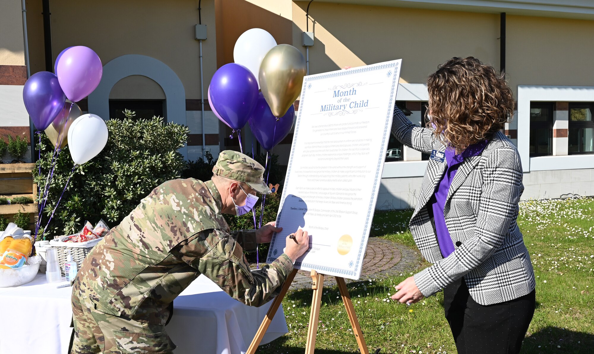 31 FW leadership signs Month of the Military Child proclamation