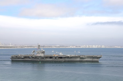 USS Abraham Lincoln (CVN 72) departs San Diego April 5, 2021, headed out to sea trials after undergoing a seven-month Planned Incremental Availability at Puget Sound Naval Shipyard & Intermediate Maintenance Facility's San Diego Detachment. Lincoln successfully completed sea trials April 7, 2021. (PSNS & IMF photo by Robin Lee)