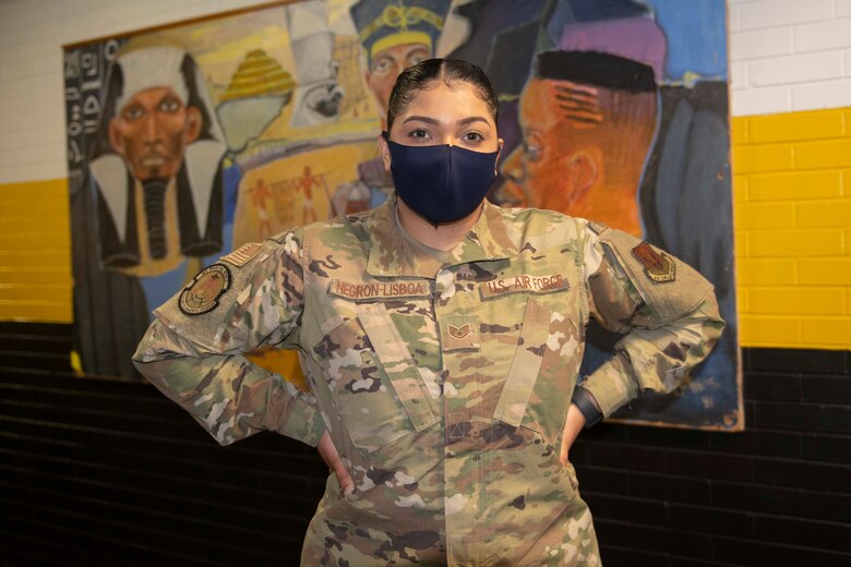 Staff Sgt. Madeline Negron-Lisboa, from Norwich, Conn., and 335th Expeditionary Medical Operations Squadron general purpose Airman, takes a short break at the state-led, federally-supported Medgar Evers College Community Vaccination Center in Brooklyn, N.Y., March 22, 2021. Negron-Lisboa, who is deployed from the 325th Logistics Readiness Squadron out of Tyndall Air Force Base, Fla., was born in Puerto Rico and translates for Spanish-speaking community members who have questions while receiving their COVID-19 vaccination. (U.S. Air Force photo by Tech. Sgt. Ashley Nicole Taylor)