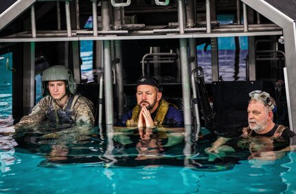 A Kentucky Army National Guard cadet with the University of Kentucky’s ROTC program in the 'Dunker' during advanced underwater egress training March 12, 2021, under the direction of the instructors with the 160th Special Operations Aviation Regiment at Fort Campbell, Ky.