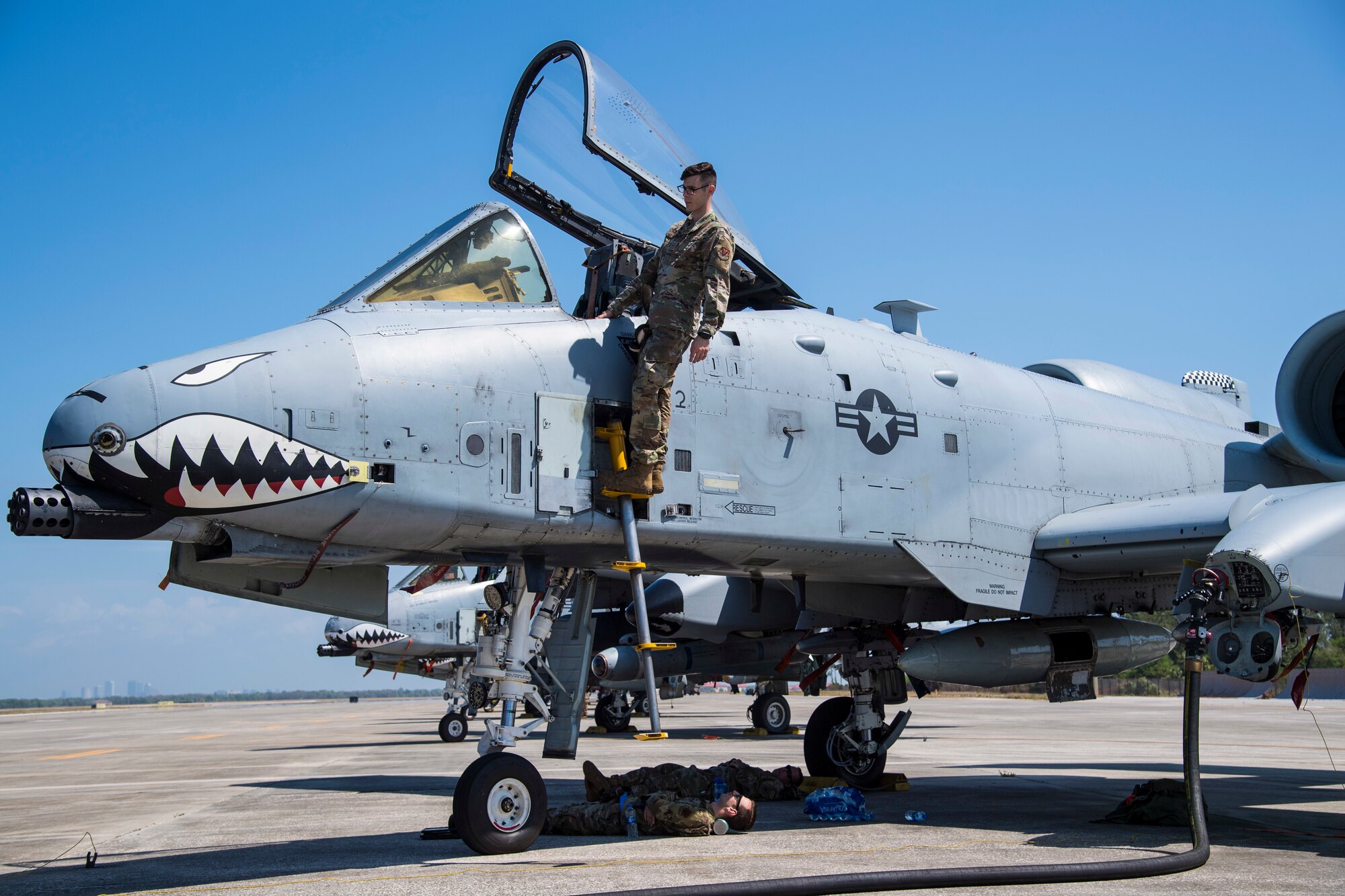 Aircraft maintainers from the 23rd Maintenance Squadron inspect an A-10C Thunderbolt II aircraft assigned to the 74th Fighter Squadron, March 18, 2021, at MacDill Air Force Base, Fla