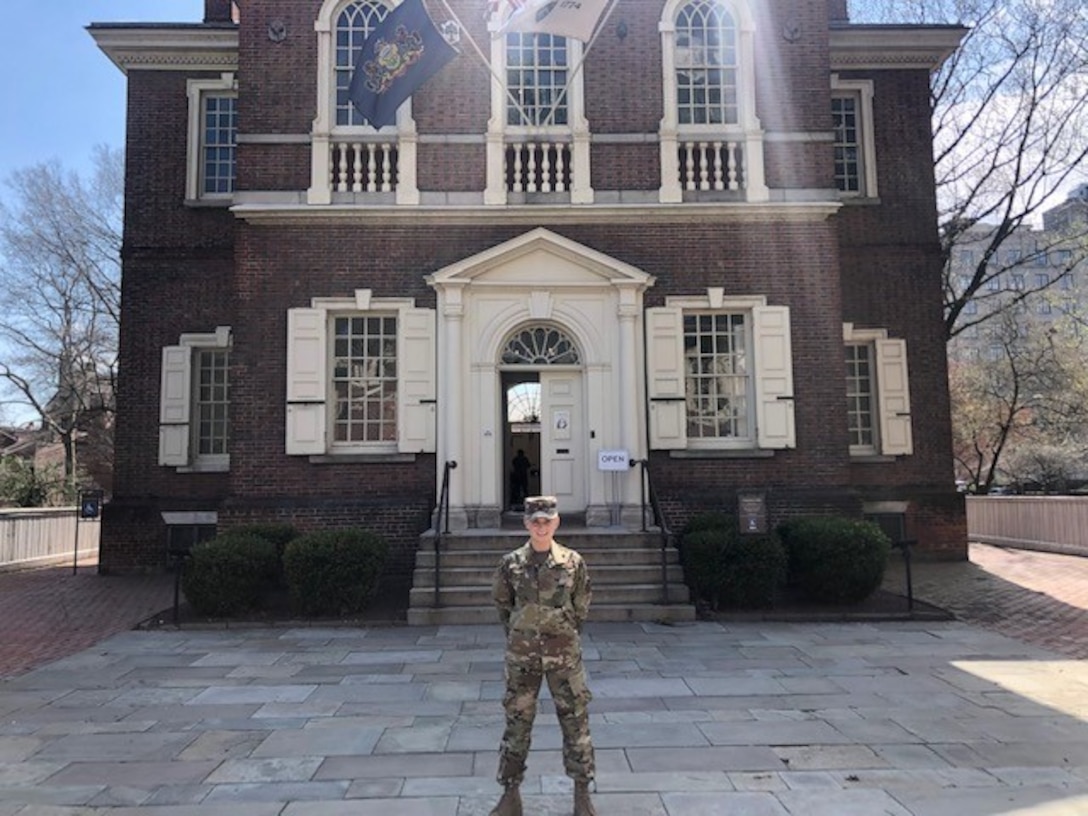 Air Force med tech 2nd Lt. Miller in front of Carpenters’ Hall in Philadelphia, Pennsylvania.