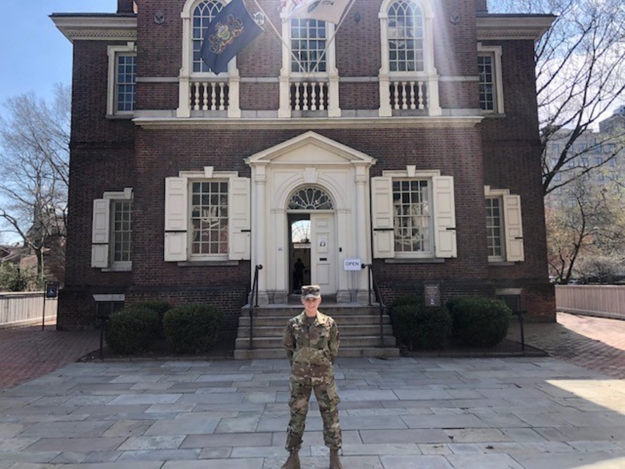 Air Force med tech 2nd Lt. Miller in front of Carpenters’ Hall in Philadelphia, Pennsylvania.