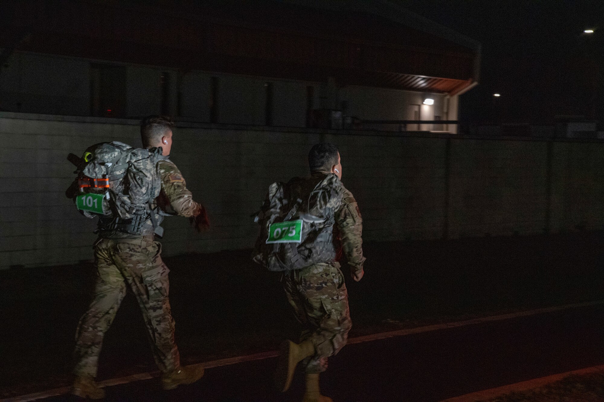 Two Joint Communications Support Element members finish the Norwegian Foot March on April 2, 2021, at MacDill Air Force Base, Fla.