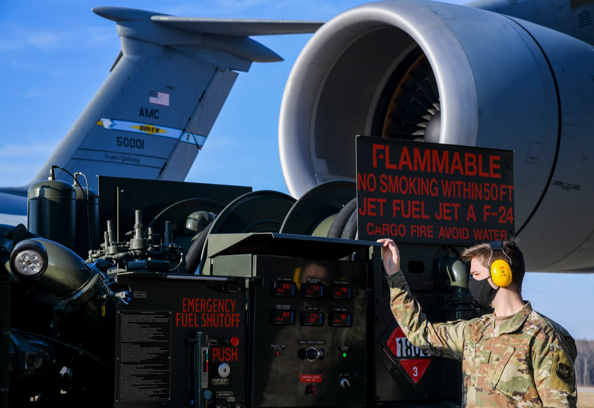 Airman 1st Class Cameron Hurst, 436th Logistics Readiness Squadron mobile distribution operator, reads a control panel on a fuel truck at Dover Air Force Base, Delaware, Jan. 13, 2021. Operators use the panel for important details about the fueling process, including the amount of fuel to be dispensed. (U.S. Air Force photo by Airman 1st Class Stephani Barge)