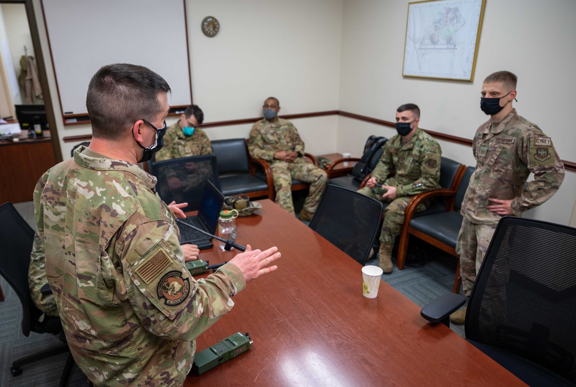 Tech. Sgt. Jason Byrd, 436th Communications Squadron cyber plans and programs noncommissioned officer in charge, explains battlefield radio usage to Team Dover’s Multi-Capable Airmen team during exercise Razor Talon at Seymour Johnson AFB, North Carolina, March 22, 2021. The base’s MCA program developed and equipped seven Airmen to perform tasks outside of their Air Force Specialty Codes. Exercises such as RT help integrate MCA into joint and combined expeditionary operations around the globe.  (U.S. Air Force photo by Airman 1st Class Faith Schaefer)