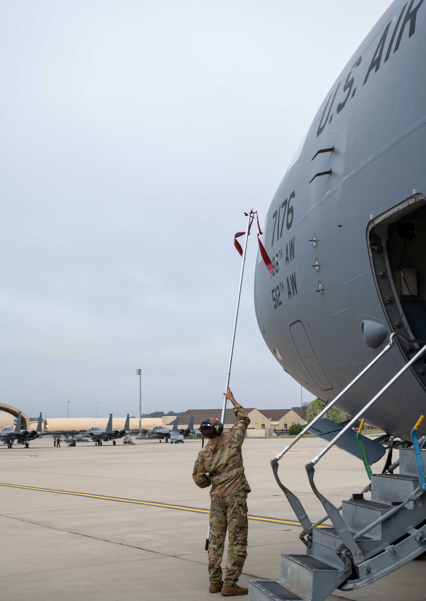 Staff Sgt. Jacorey Grimes, 736th Aircraft Maintenance Squadron crew chief, removes pitot tubes from a Dover Air Force Base C-17 Globemaster III during exercise Razor Talon at Seymour Johnson AFB, North Carolina, March 22, 2021. Mobility Airmen participated in RT to enhance readiness and assist in implementation of the Agile Combat Employment concept across the Air Force. (U.S. Air Force photo by Airman 1st Class Faith Schaefer)