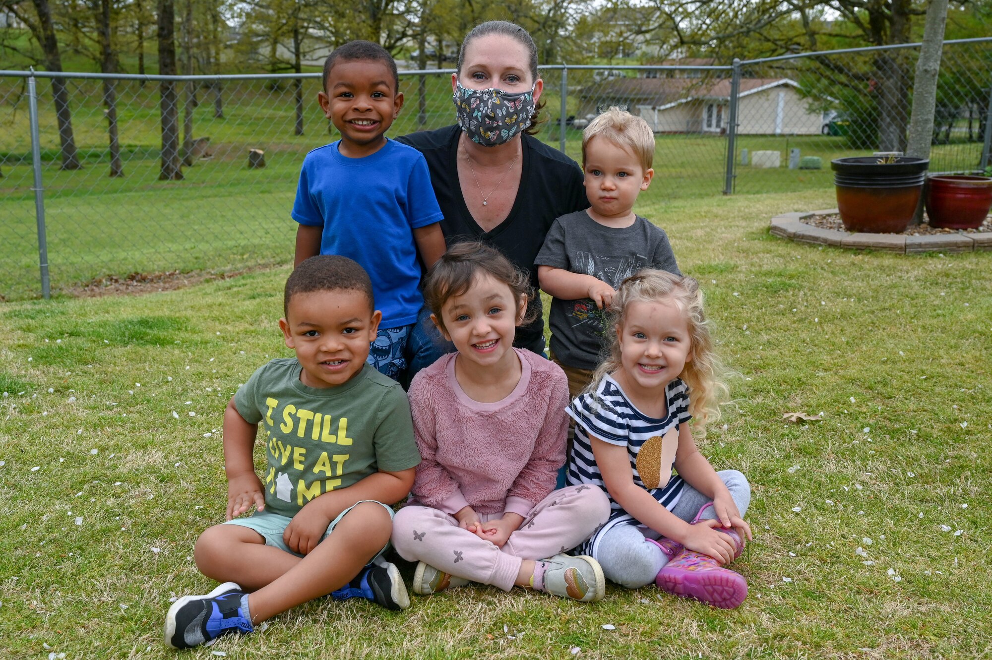 a woman and children