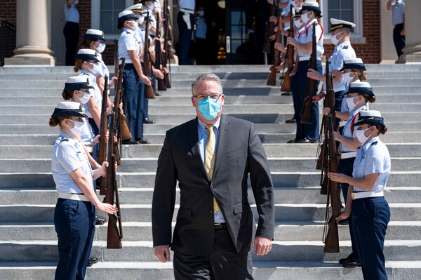 NEW LONDON, Conn. (April 5, 2021) Acting Secretary of the Navy Thomas W. Harker departs the U.S. Coast Guard Academy after touring the facility with Rear Adm. William G. Kelly, 42nd superintendent of the U.S. Coast Guard Academy.