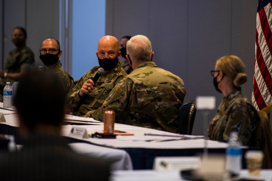 U.S. Space Force Gen. John W. “Jay” Raymond, Chief of Space Operations, speaks with U.S. Air Force Lt. Gen. John F. Thompson, Space and Missile Systems Center commander and Program Executive Officer for Space, and other participants of a Senior Leader Summit at Los Angeles Air Force Base, California, April 7, 2021. SMC employs an estimated 6,300 people including military, civilian employees and contractors at LAAFB and other locations, making it an integral part of the Space Force mission. (U.S. Space Force photo by Staff Sgt. Luke Kitterman)
