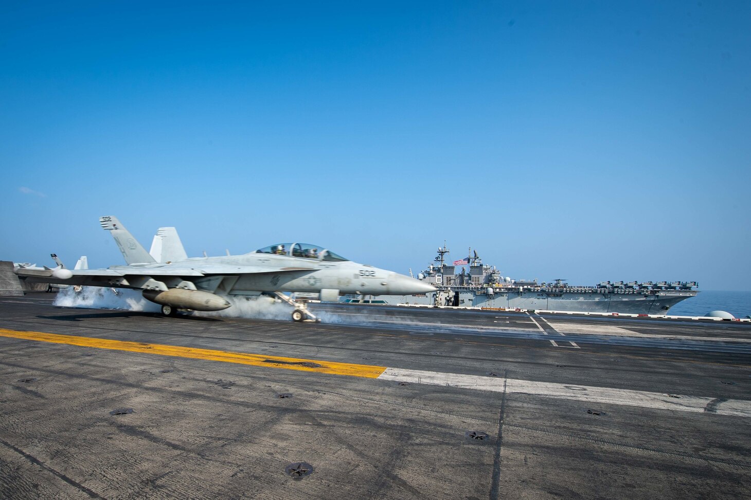 SOUTH CHINA SEA (April 9, 2021) – An EA-18G Growler, assigned to the “Gray Wolves” of Electronic Attack Squadron (VAQ) 142, launches from the flight deck of the aircraft carrier USS Theodore Roosevelt (CVN 71) in the South China Sea April 9, 2021. The Theodore Roosevelt Carrier Strike Group, Makin Island Amphibious Ready Group and the Ticonderoga-class guided-missile cruiser USS Port Royal (CG 73) are conducting expeditionary strike force operations during their deployments to the 7th Fleet area of operations. As the U.S. Navy's largest forward-deployed fleet, 7th Fleet routinely operates and interacts with 35 maritime nations while conducting missions to preserve and protect a free and open Indo-Pacific region. (U.S. Navy photo by Mass Communication Specialist 3rd Class Dartañon D. De La Garza)