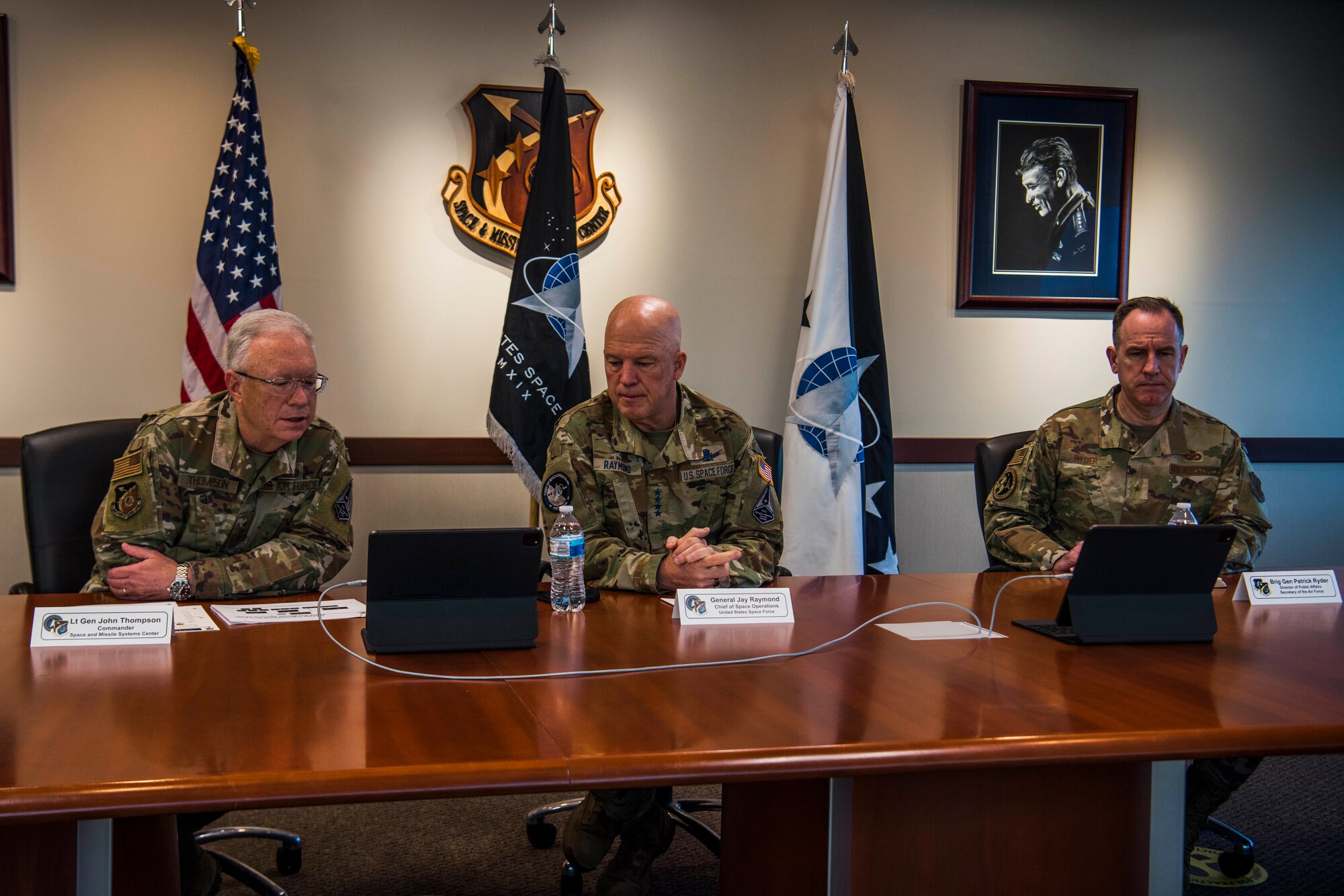 U.S. Air Force Lt. Gen. John F. Thompson, Space and Missile Systems Center commander and Program Executive Officer for Space, left, U.S. Space Force Gen. John W. “Jay” Raymond, Chief of Space Operations, middle, and U.S. Air Force Brig. Gen. Patrick S. Ryder, Director of Public Affairs, Office of the Secretary of the Air Force, host a Civic Leadership Engagement at Los Angeles Air Force Base, California, April 8, 2021. During the virtual meeting, Raymond and Thompson spoke about the release of the organizational structure for the Space Systems Command. (U.S. Space Force photo by Staff Sgt. Luke Kitterman)