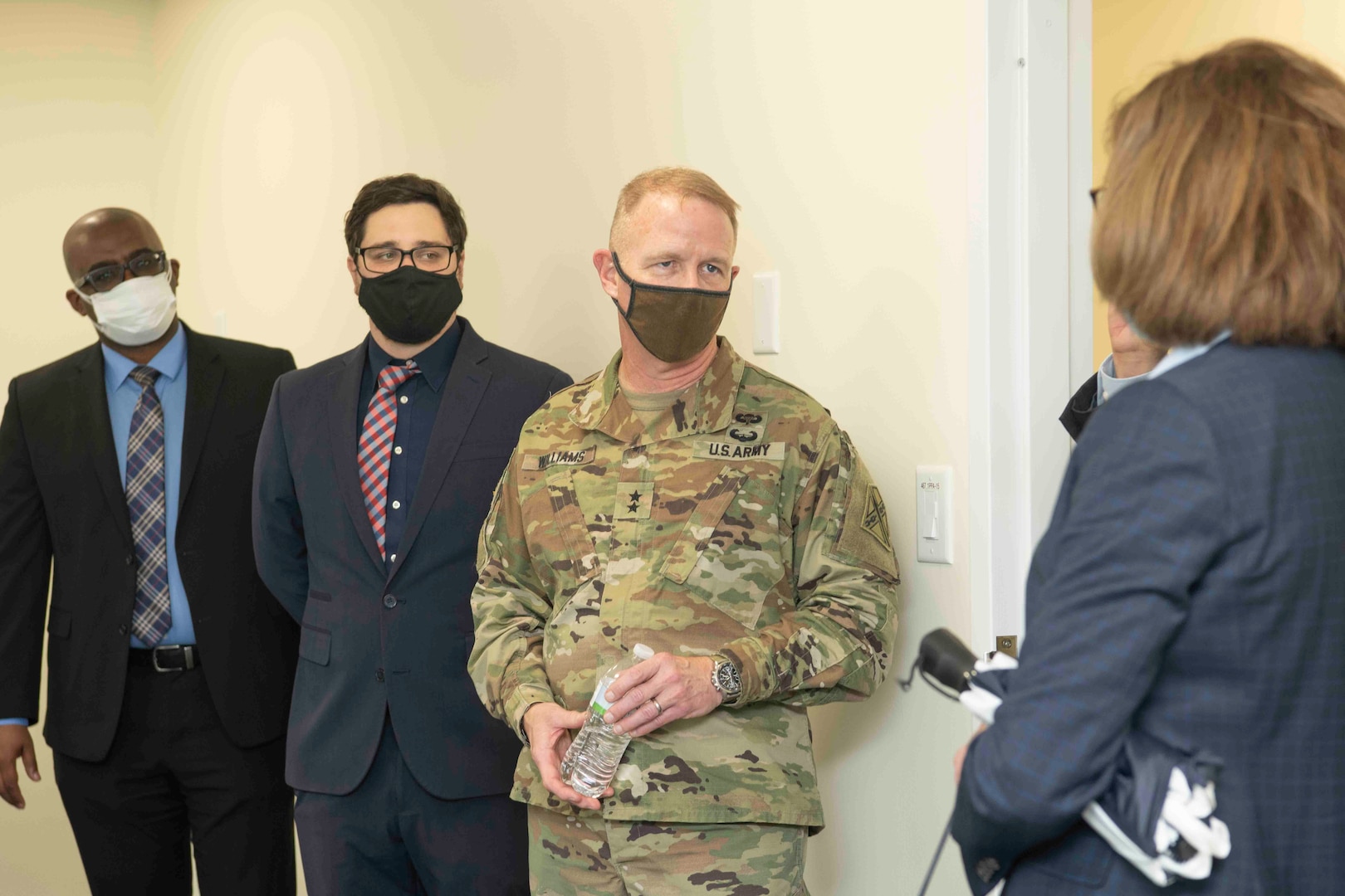 A U.S. military general speaks to state representatives